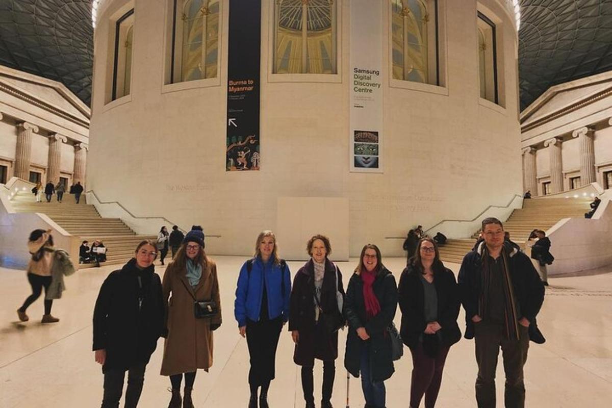 a group of people walking in a building