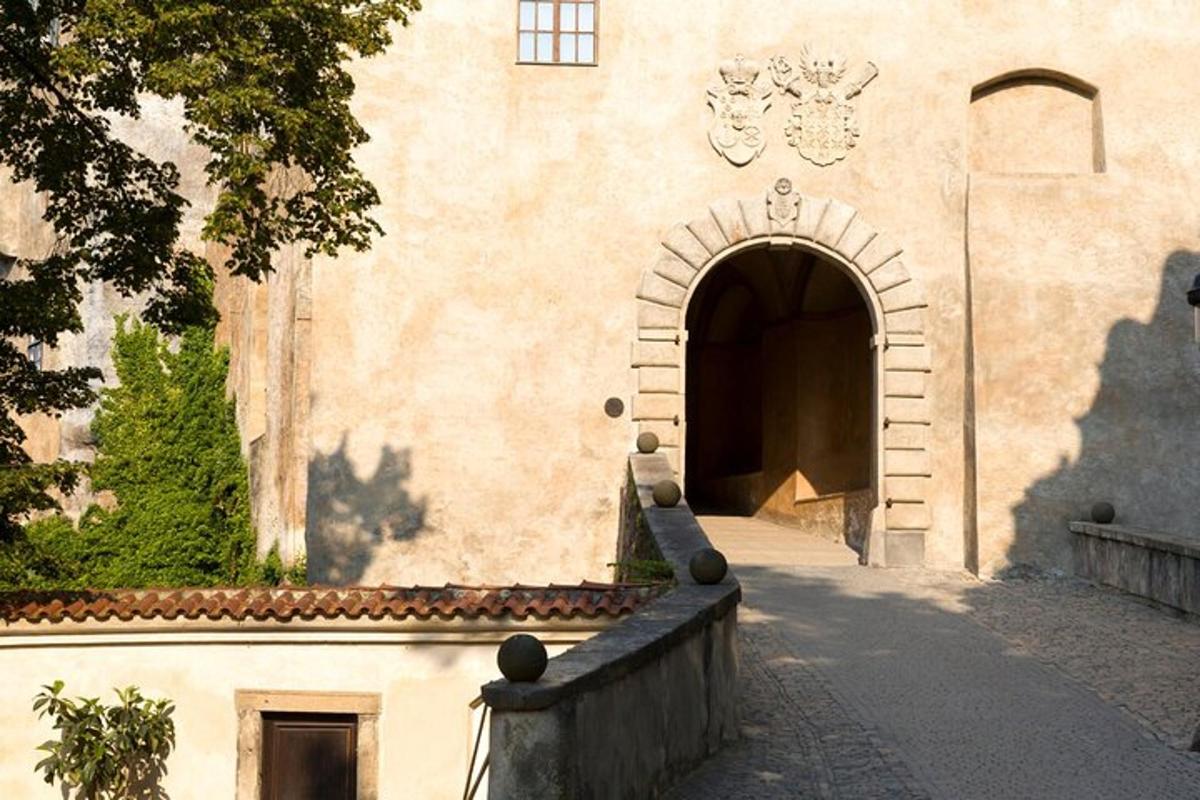 an entry to a building with an arch way