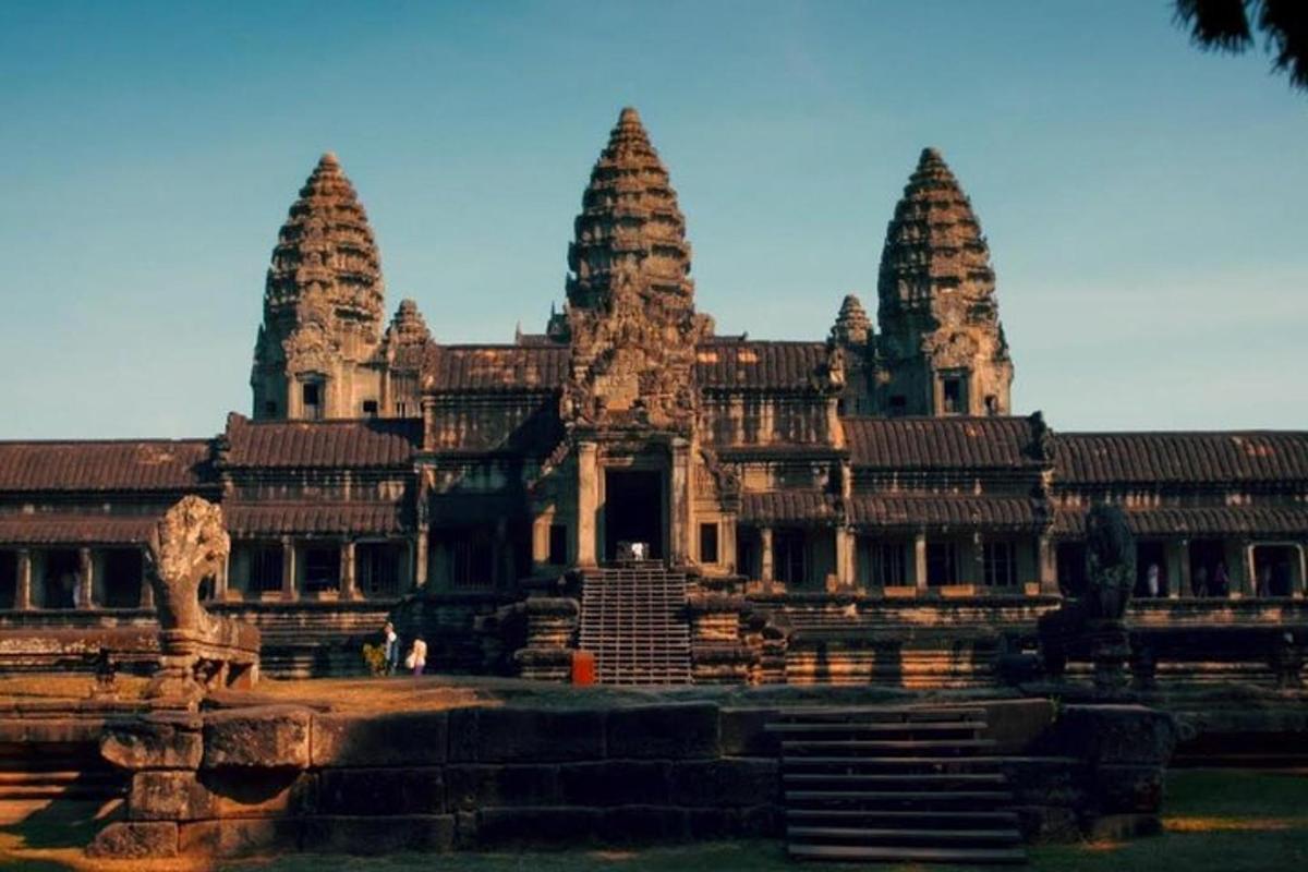 a large building with three towers on top of it