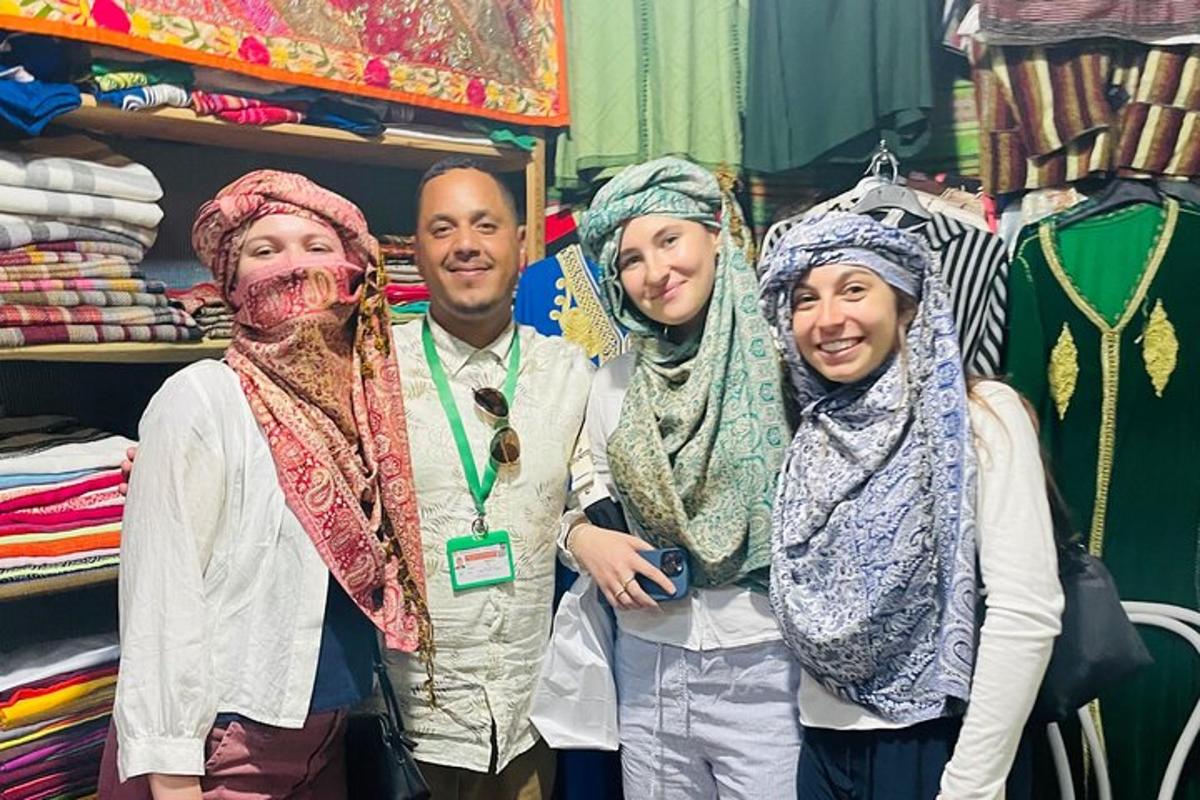 a group of three people posing for a picture in a store
