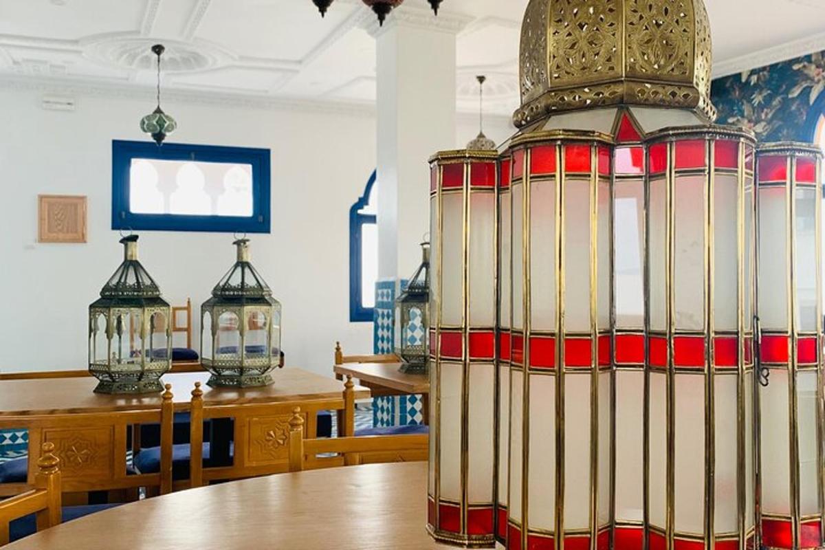 a room with a wooden table with a large lantern on it