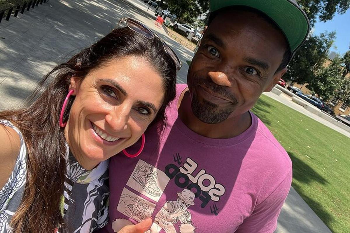 a man and a woman posing for a picture
