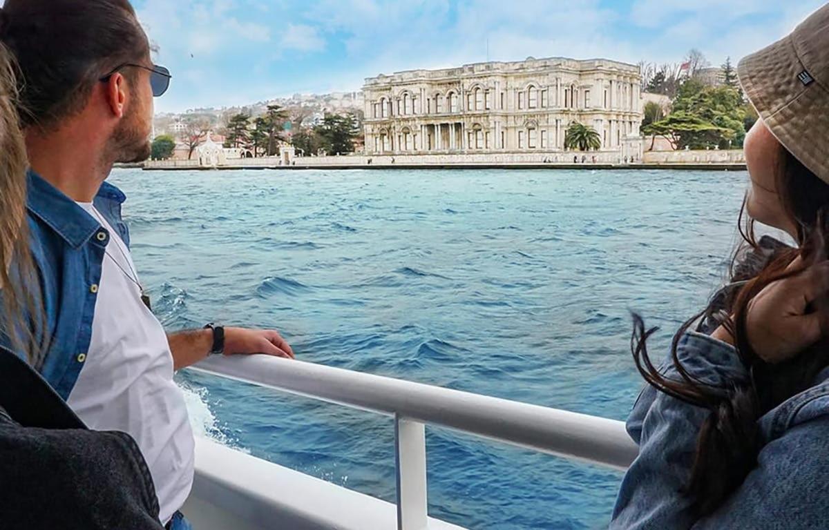 a man and a woman on a boat in the water