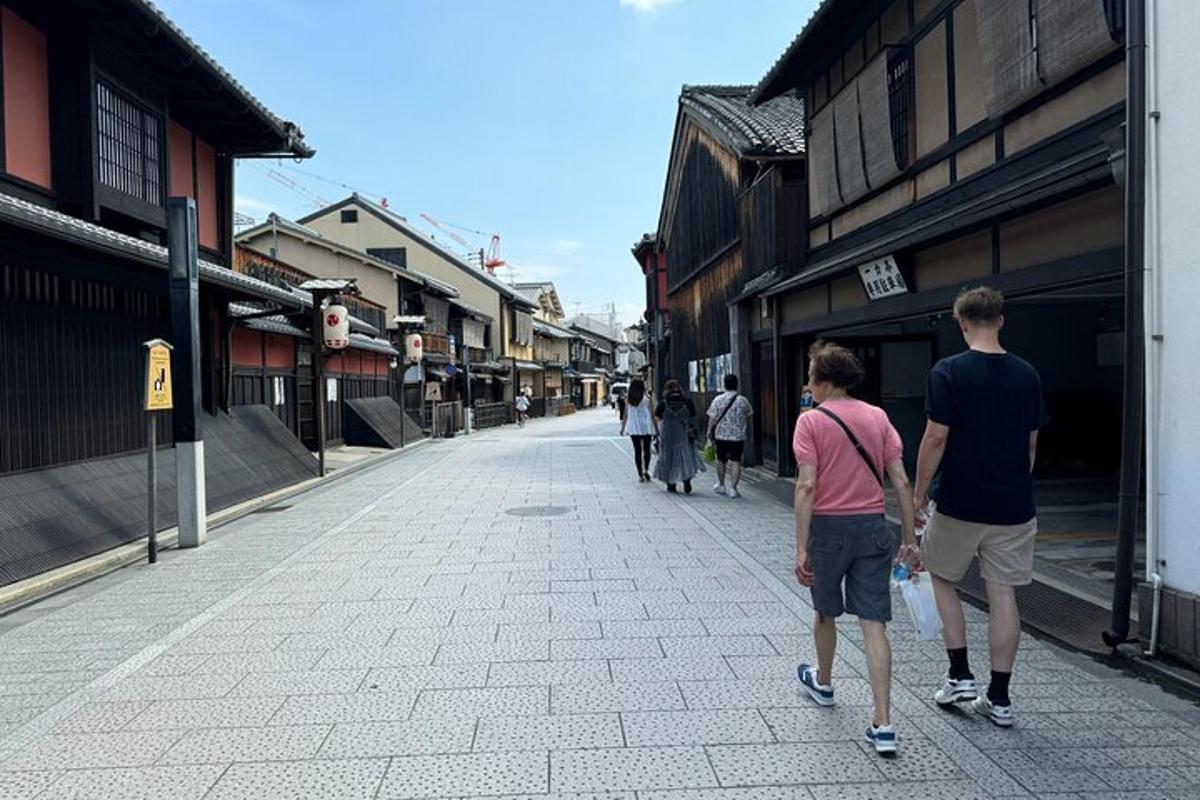 a group of people walking down a street