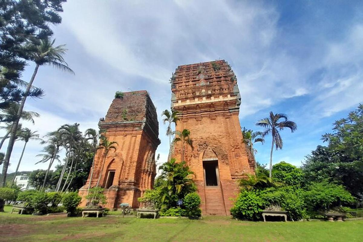 a building with two towers in a park