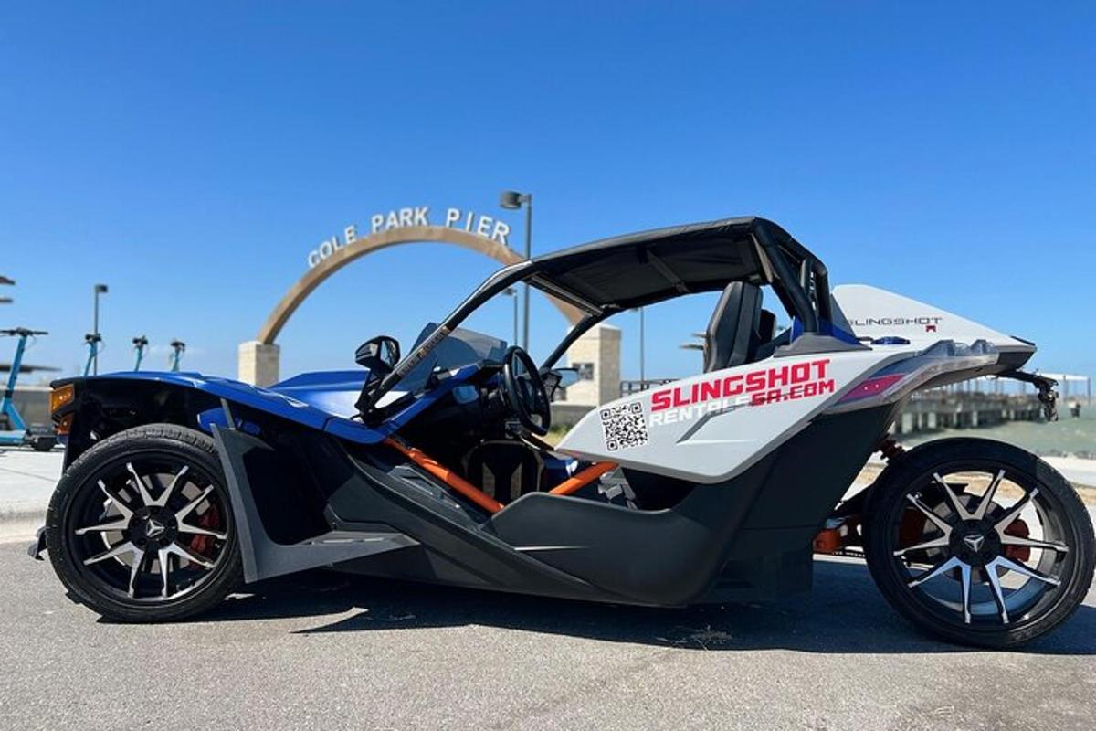 a small car parked in a parking lot