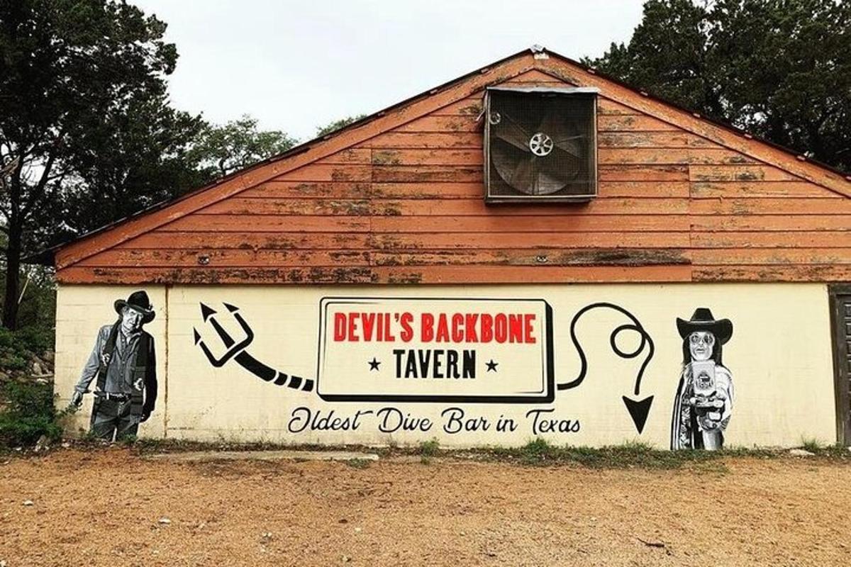 a barn with graffiti on the side of it