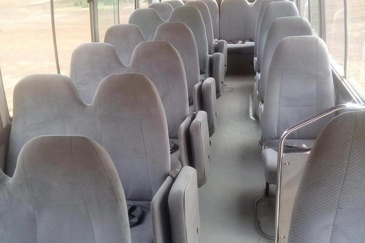 a row of empty seats on a bus