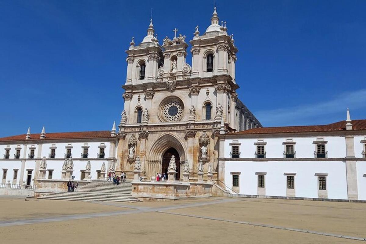 a large building with a tower with a clock on it