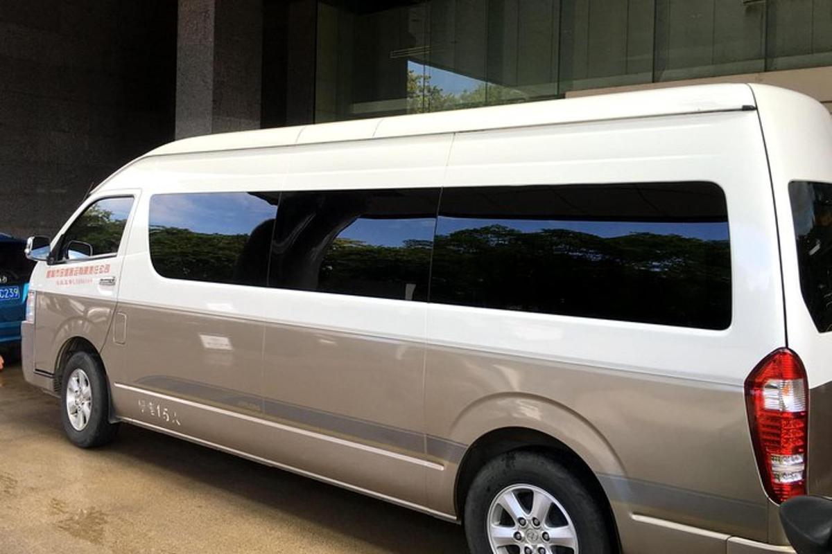 a white van is parked in a parking lot
