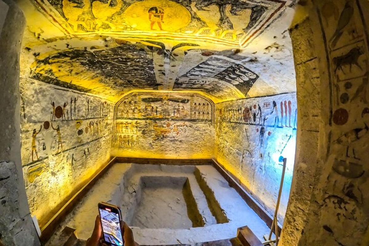 an inside view of a room with paintings on the walls