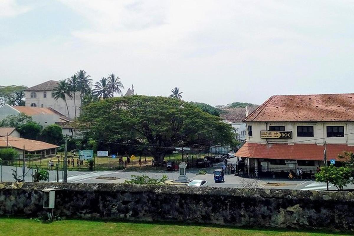 a view of a town with a building and a street
