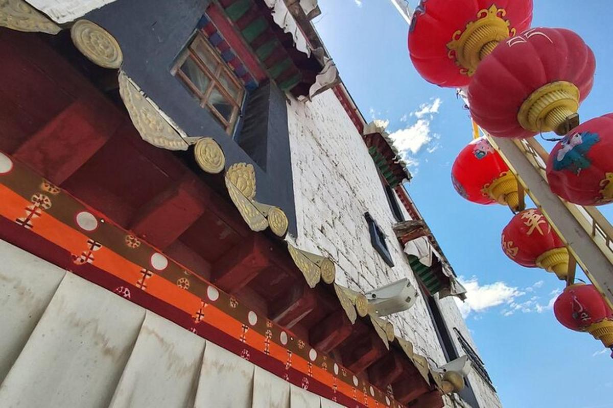a building with red and yellow lanterns on it