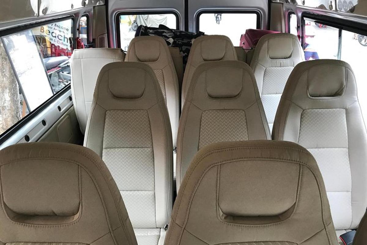 a row of seats in the back of a van