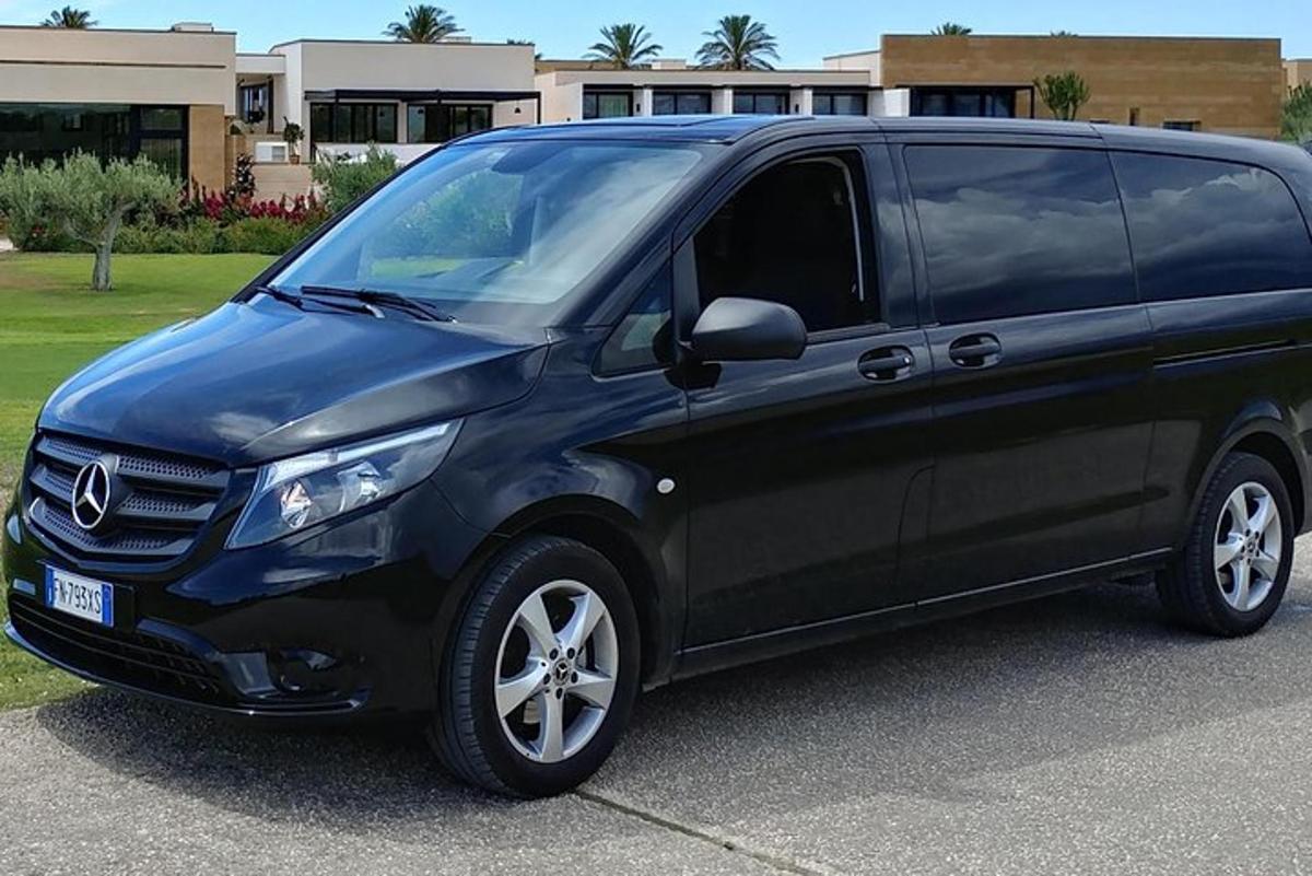a black van parked in a parking lot