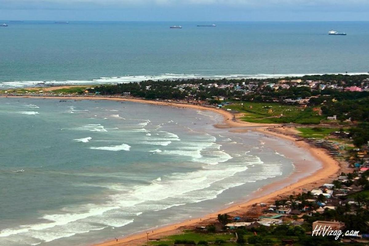 an aerial view of a beach with waves