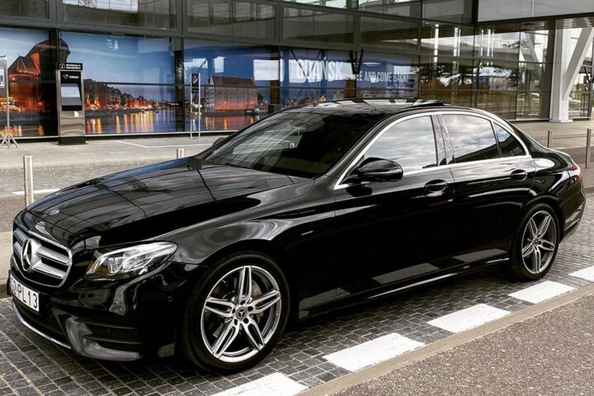 a black car parked in a parking lot