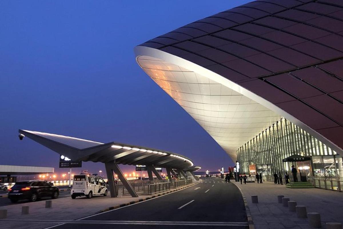 a large building with a lit up facade at night