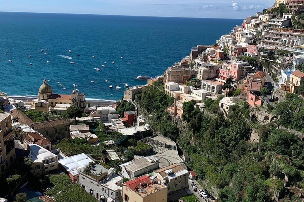 an aerial view of a city and the ocean
