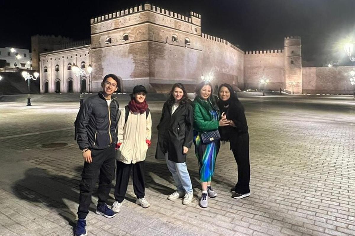 a group of people standing in front of a building