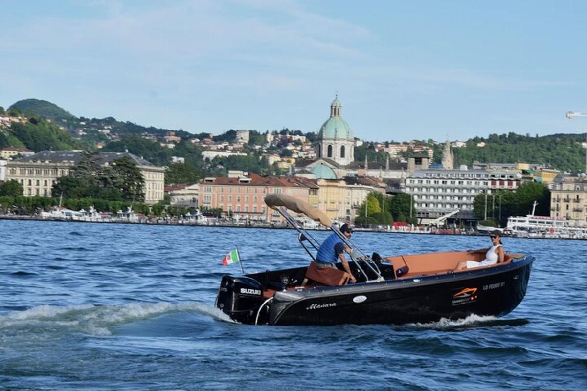 a group of people in a boat in the water