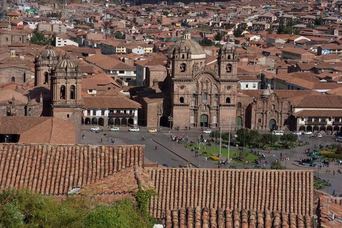 a view of a city with a cathedral and buildings