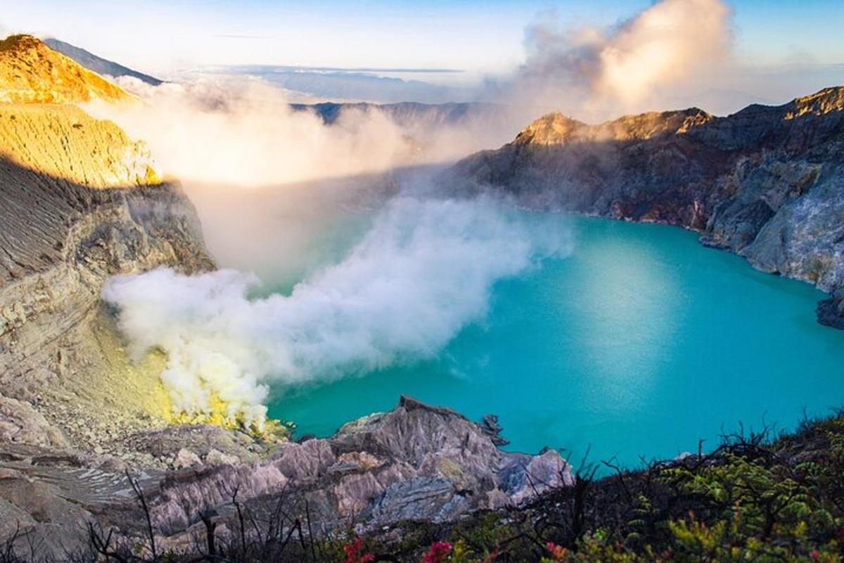 a view of a blue lake in the mountains