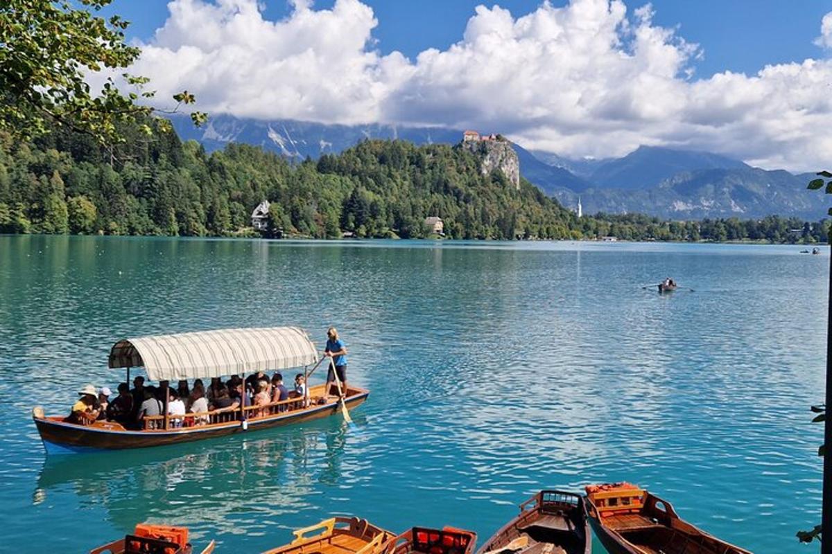 a group of people on a boat on a lake