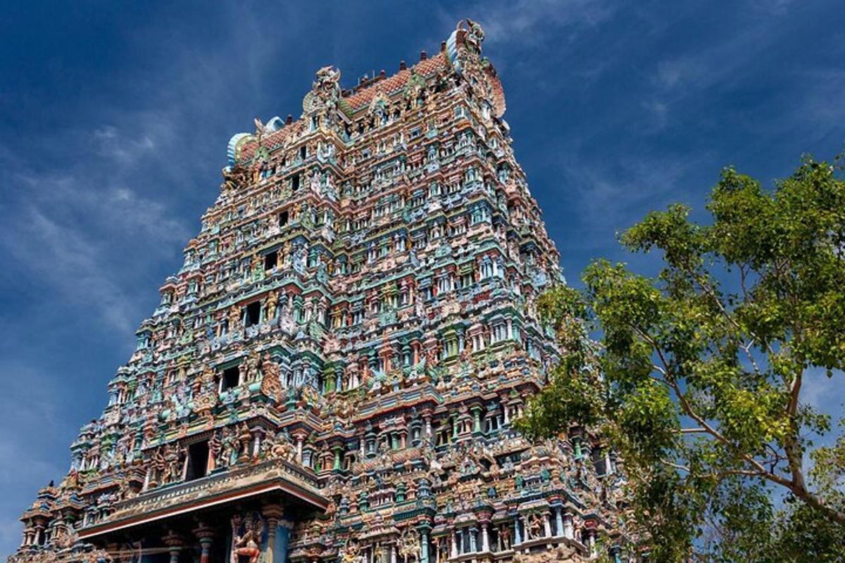 a tall building with ornate architecture on top of it