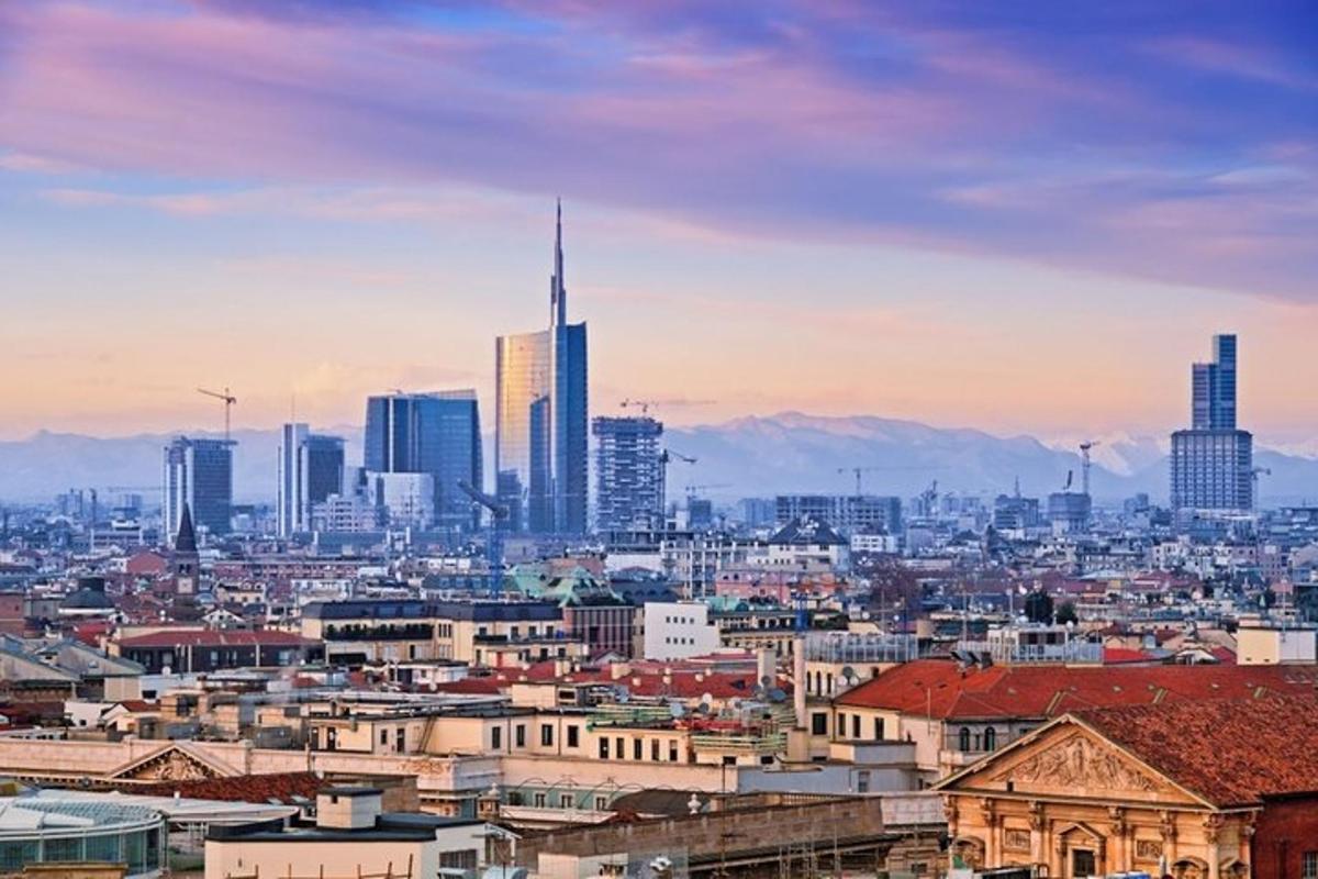 a cityscape of a city with a tall skyscraper