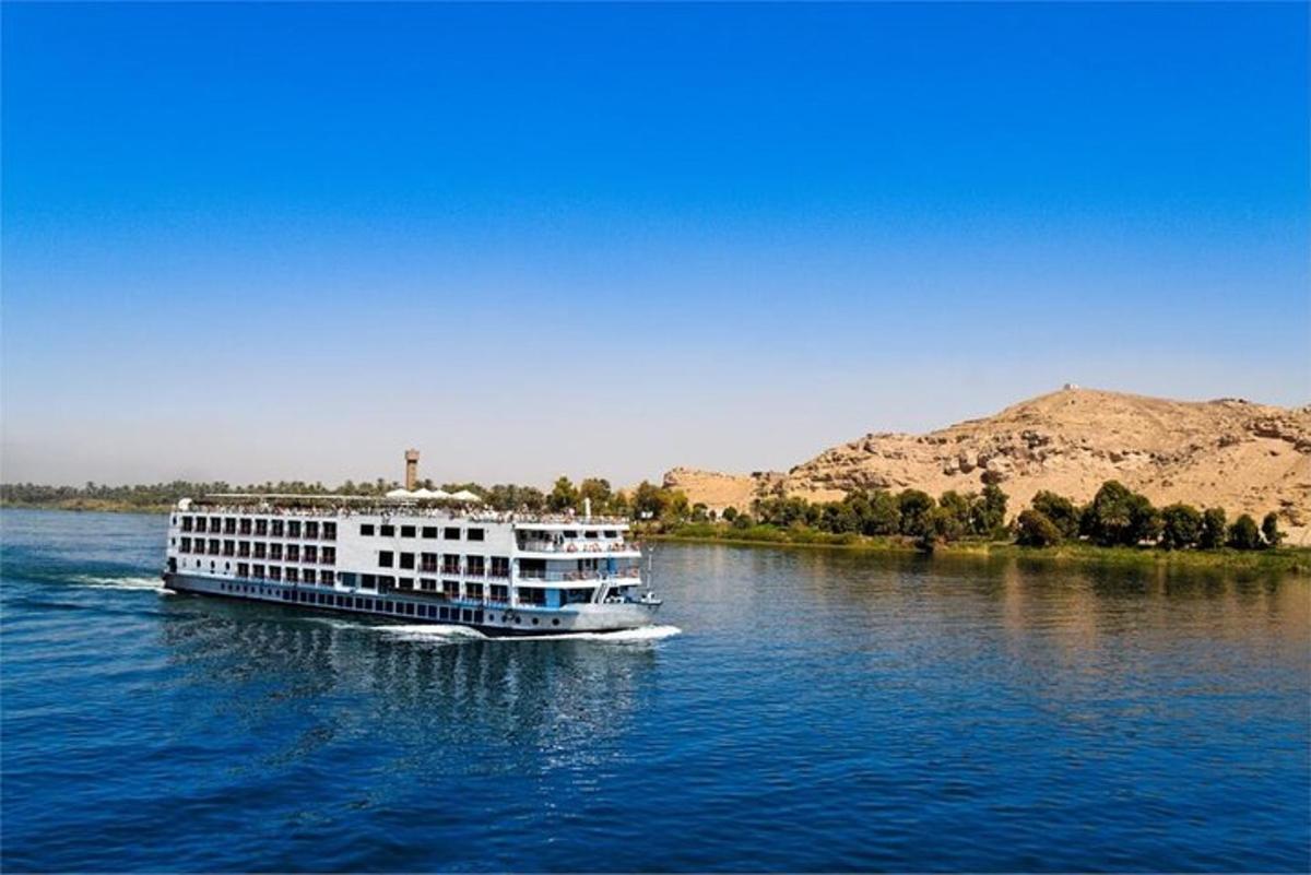 a large boat on the water on a river