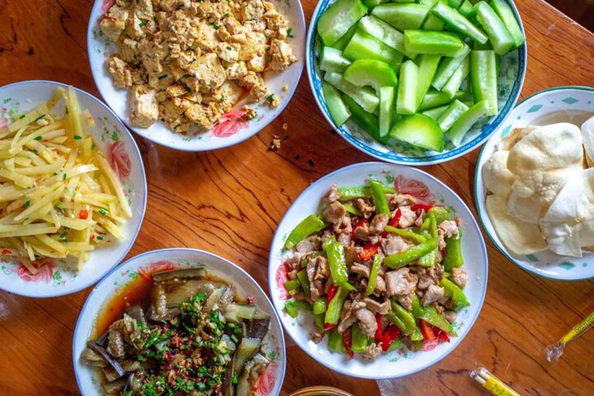 a table topped with bowls of different types of food