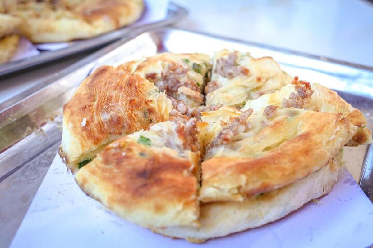 a small pizza sitting on top of a table