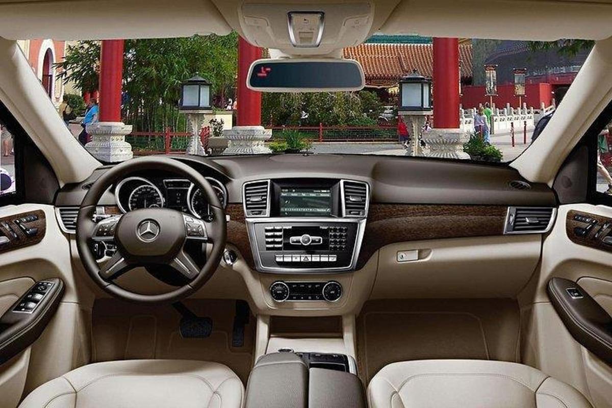 a view of the dashboard of acedes benz car