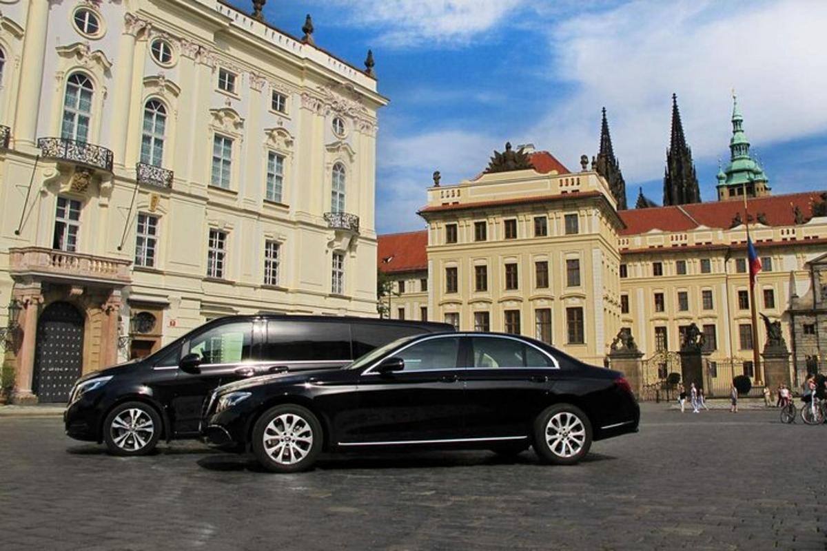 a black car parked in front of a building