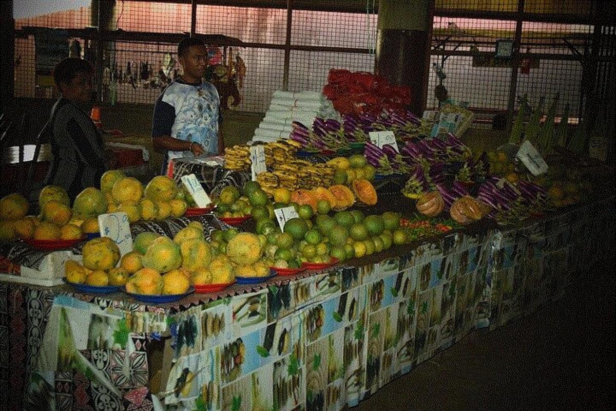 a table filled with lots of fruits and vegetables