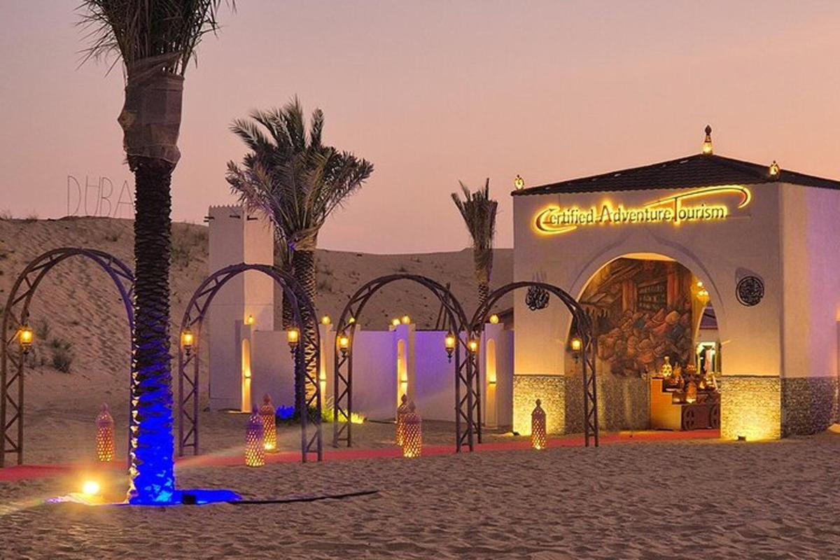a wedding venue in the desert with palm trees and lights