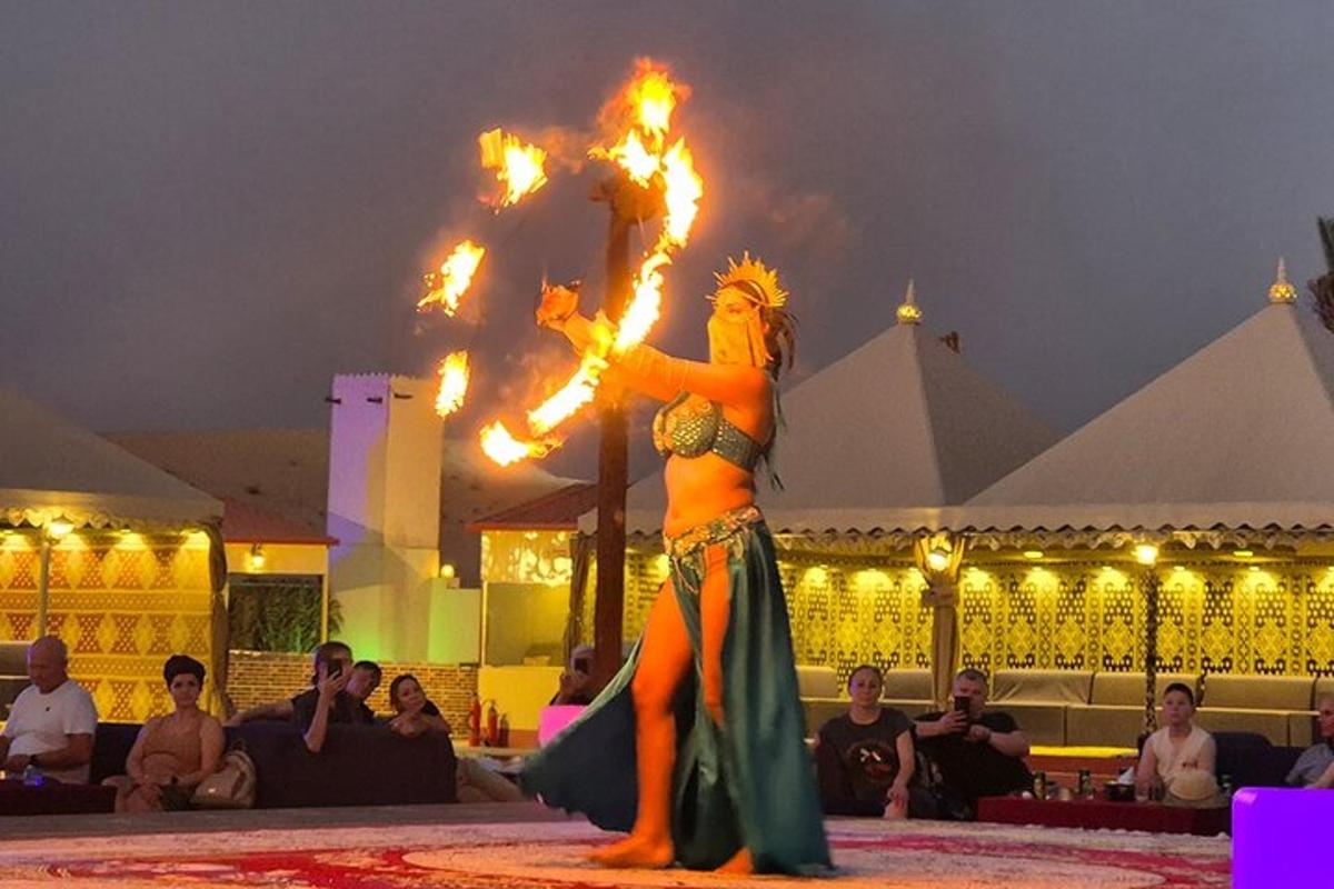 a woman in a performance with fire in her hair