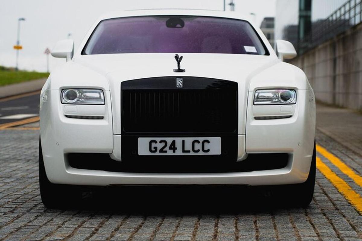 a white car parked in a parking lot
