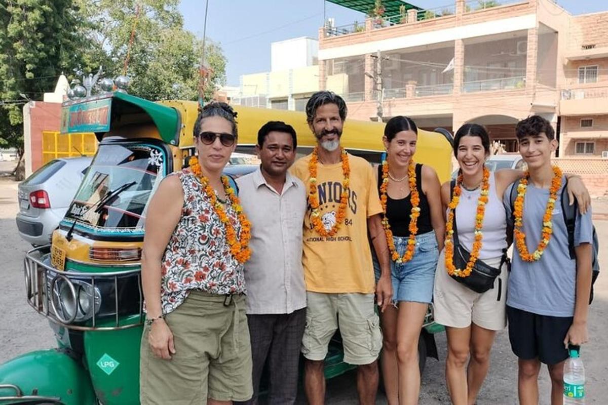 a group of people standing in front of a van