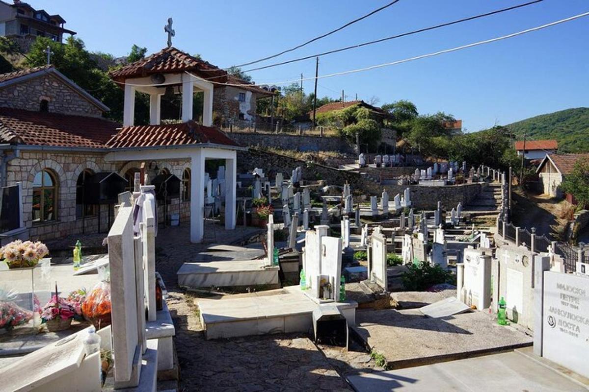 a group of graves in front of a church