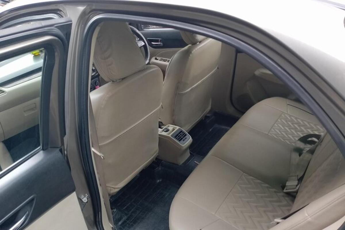 an empty back seat of a car with the back seats open