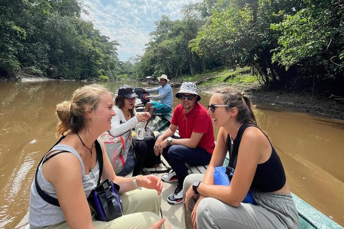 a group of people on a boat in a river
