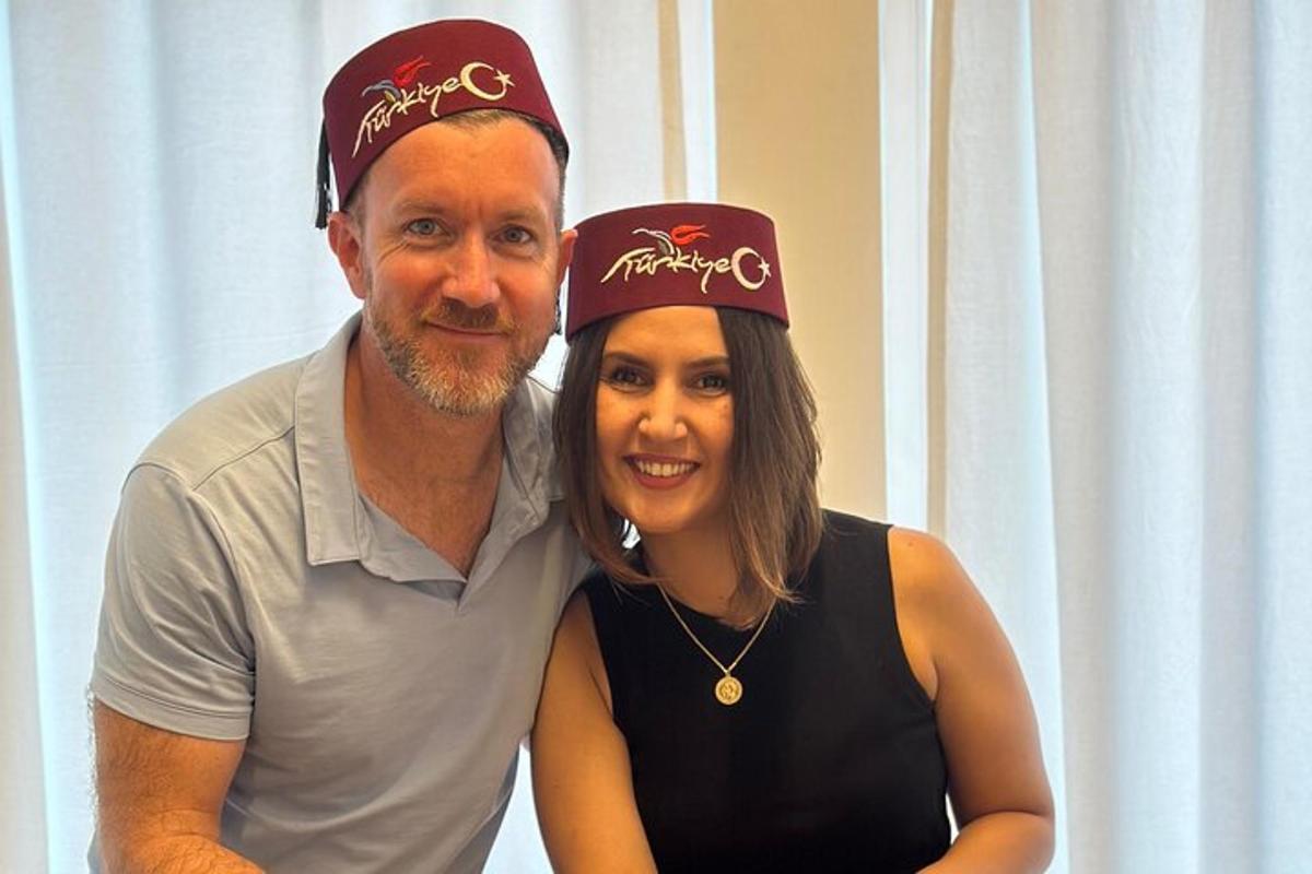 a man and a woman wearing hats on their heads