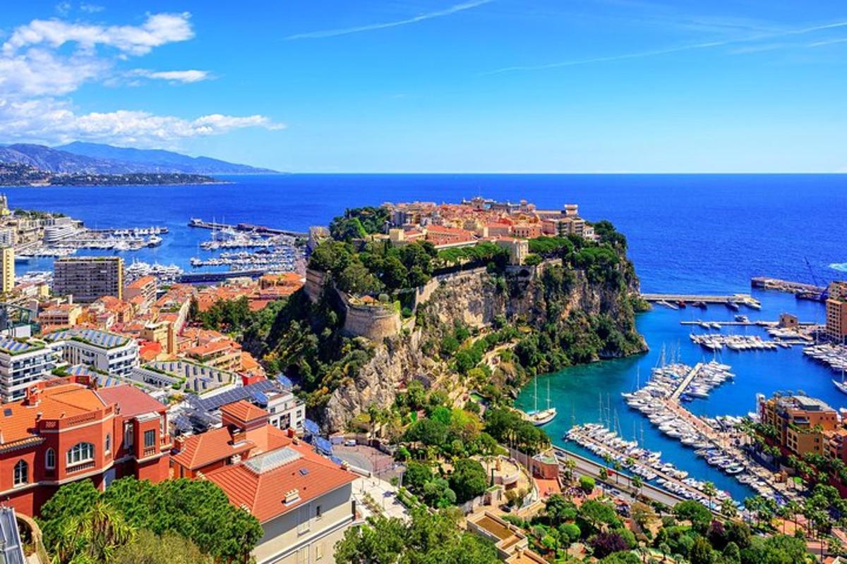 a view of a city with boats in a harbor