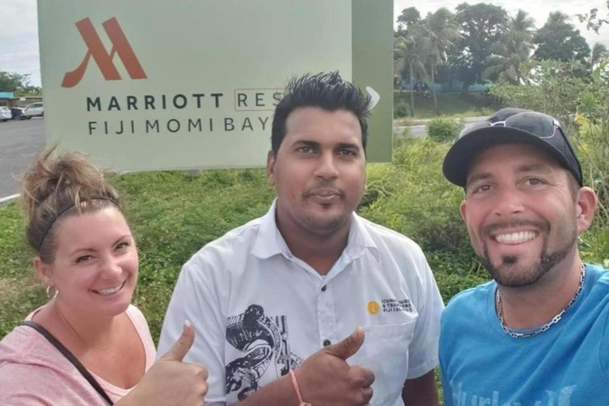 a group of three people giving the thumbs up