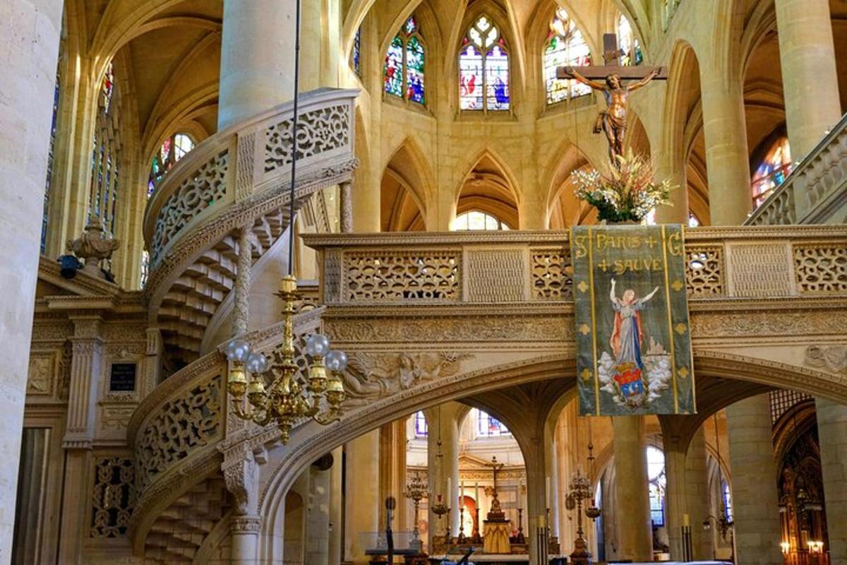 a church with a staircase and a painting of a woman