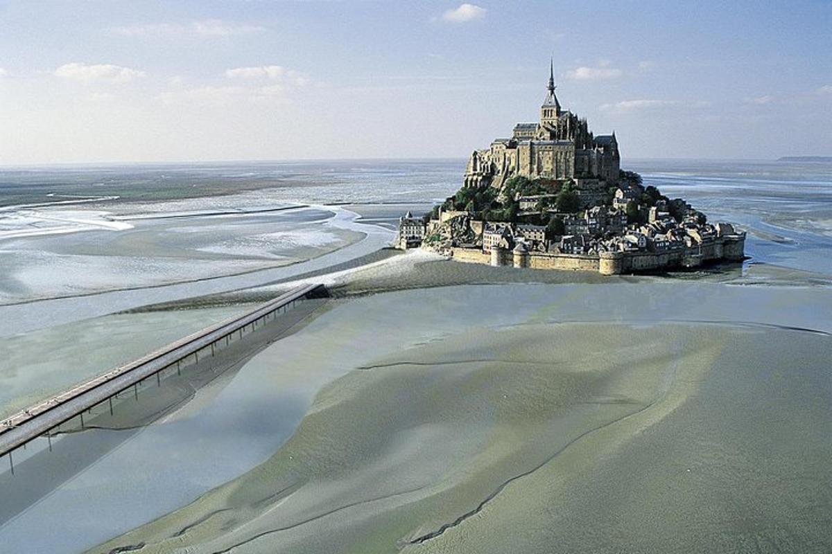 an island in the water with a castle on it