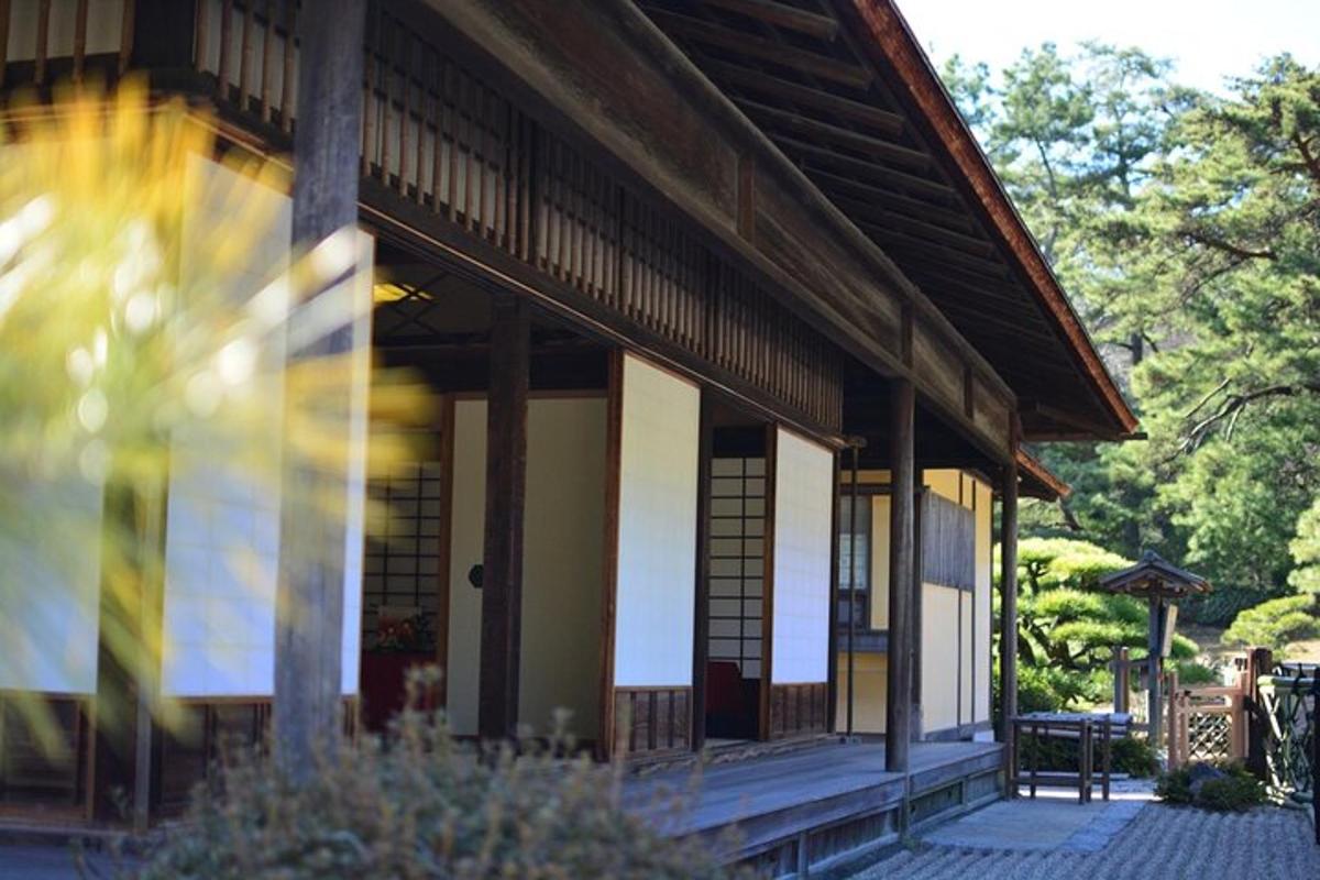 a building with a porch with a bench on it