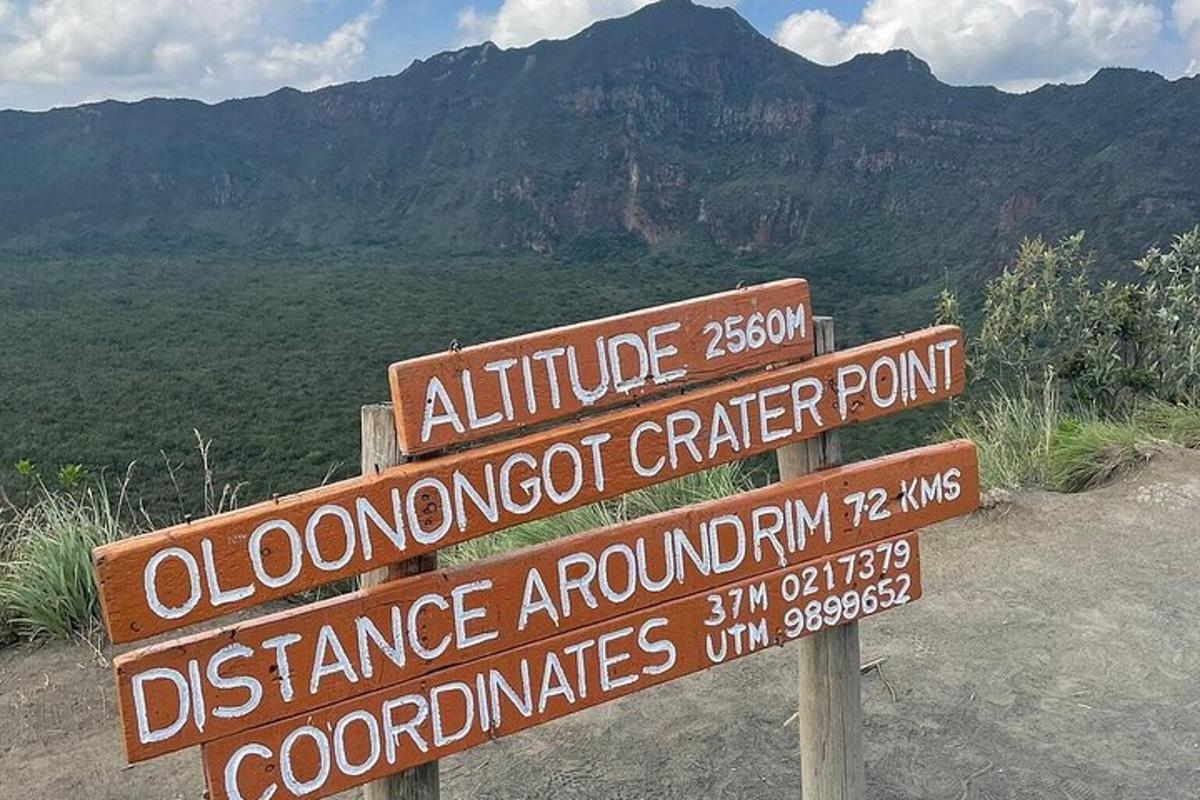 a sign at the top of a mountain